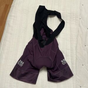 Tres Piñas purple bibs size medium. Used a few times